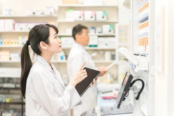 Woman checking supplements in store