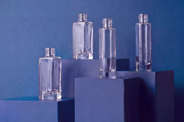 Image glass bottle display against faint purple background
