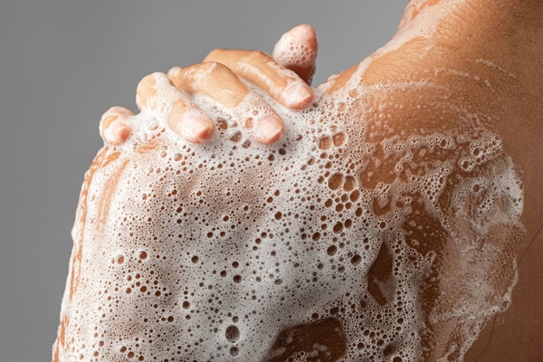 foamy soap on shoulder