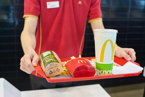 Image McDonalds server holding tray with food