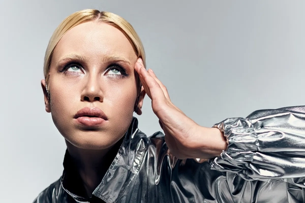Image woman in shiny metallic outfit