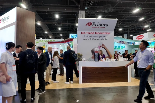 Prinova booth with people at SupplySide Global 2026.
