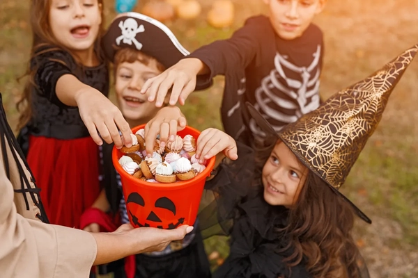 children taking candies at halloween children taking candies at halloween
